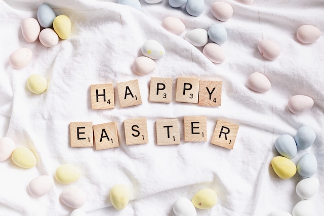 Happy Easter in scrabble letters with candy easter eggs